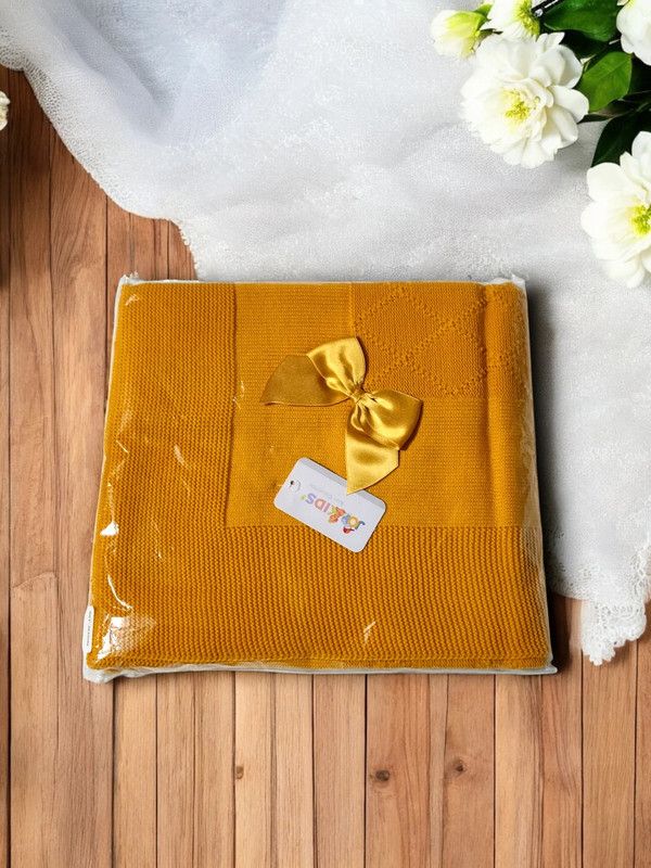 Manta de bebé com laço - Suavidade e estilo gallery image Manta de bebé com laço - Suavidade e estilo